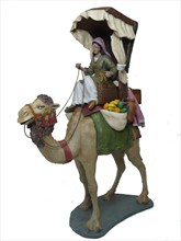 Pastora a camello con carga