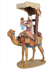 Pastora con niño a camello con carga